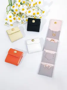 Fashionable mini travel jewelry bag, multi pocket design creative portable jewelry bag, minimalist solid color scratch resistant jewelry storage bag, buckle earrings bracelet necklace ring makeup bag, women's accessories essential for travel and vacation