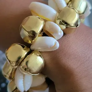 Cowrie & Bells Elastic Bracelet with Gold Jingle Bells and White Shell Beads for Festive Style Protection Abundance and Communication