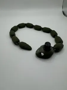 3D Printed Articulating Party Animal Snake, top hat, cowboy hat, and more