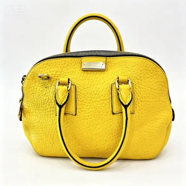 Pre-owned BURBERRY bright yellow bubble grain leather dome satchel crossbody bag with gold logo plate and top handle