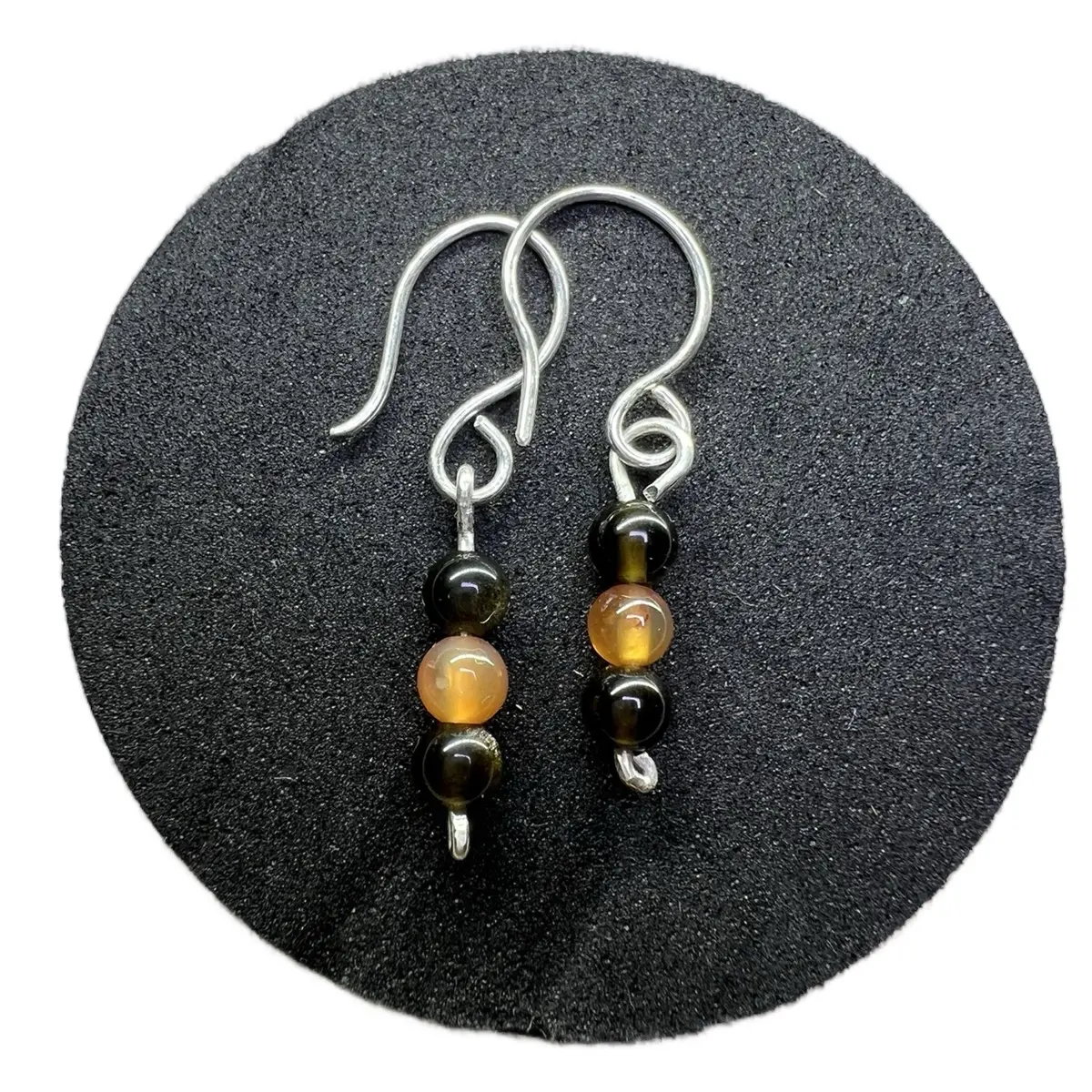 Red carnelian, obsidian, sterling silver earrings.