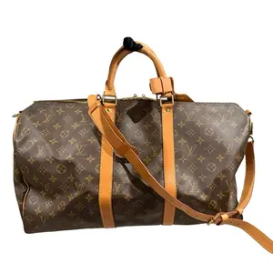 Pre-owned Louis Vuitton canvas Luggage monogram Keepall Bandouliere 50