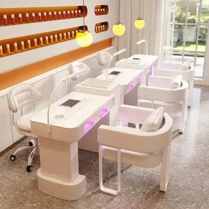 The new M1 cream style nail art table and chair set is embedded with a third-generation high-power vacuum cleaner and red light baking lamp