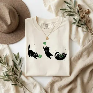 St. Patrick's Day Black Cat T-Shirt, Lucky Clover Graphic, Earthy Brown