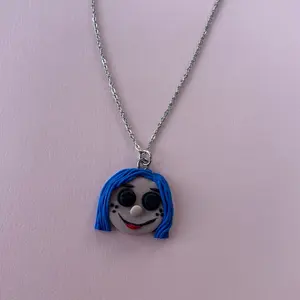 Blue Button Doll Necklace with Unique Design and Durable Chain for Everyday Wear