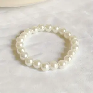 Elegant White Faux Pearls Beaded Bracelet Adjustable Elastic Rope Hand Jewelry Accessory 1pc