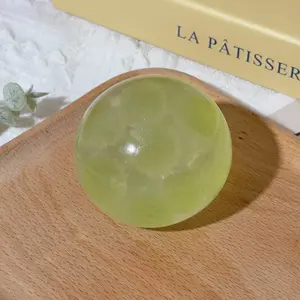 A green grape-shaped handmade  -  stress  - clarity and focus tool - sensory squeeze  in popular green, a fun   suitable for sharing with friends ball Relief Glutinous Rice Cake Toy Vibrant Hover Spinner Realistic Soft Rebound Rolls Squishy