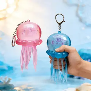 Adult-Style Transparent Blue Glitter Jellyfish Squeeze Keychains - Cute, Stress-Relieving Squeeze Fidget Keychains - Portable Hanging Accessories, Ideal for Bag Charms and Car Key Decorations