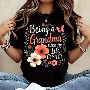 Being A Grandma Makes My Life Complete Floral Butterfly Print T Shirt Black Casual Loose Fit Tee For Women Perfect For Everyday Wear And Leisure Activities
