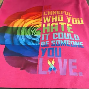 T-shirts with Rainbow Rose Design and Inspirational Quote for Pride Month