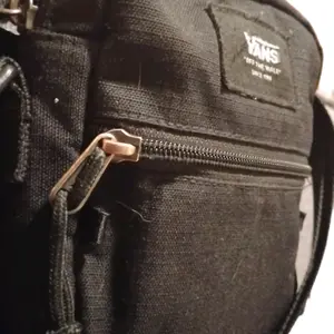Vans Mini Bag - Black Color, Zipper Closure, Shoulder Strap, Durable Design, Ideal for Everyday Use luxury handbags
