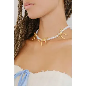 Louise Bow and Pearl Necklace