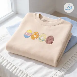 Embroidered Easter Egg Sweatshirt, Pastel Bunny Floral Spring Crewneck, Cute Cottagecore Easter Pullover for Women, Soft Seasonal Outfit Gift for Bunny Lovers  Keywords: