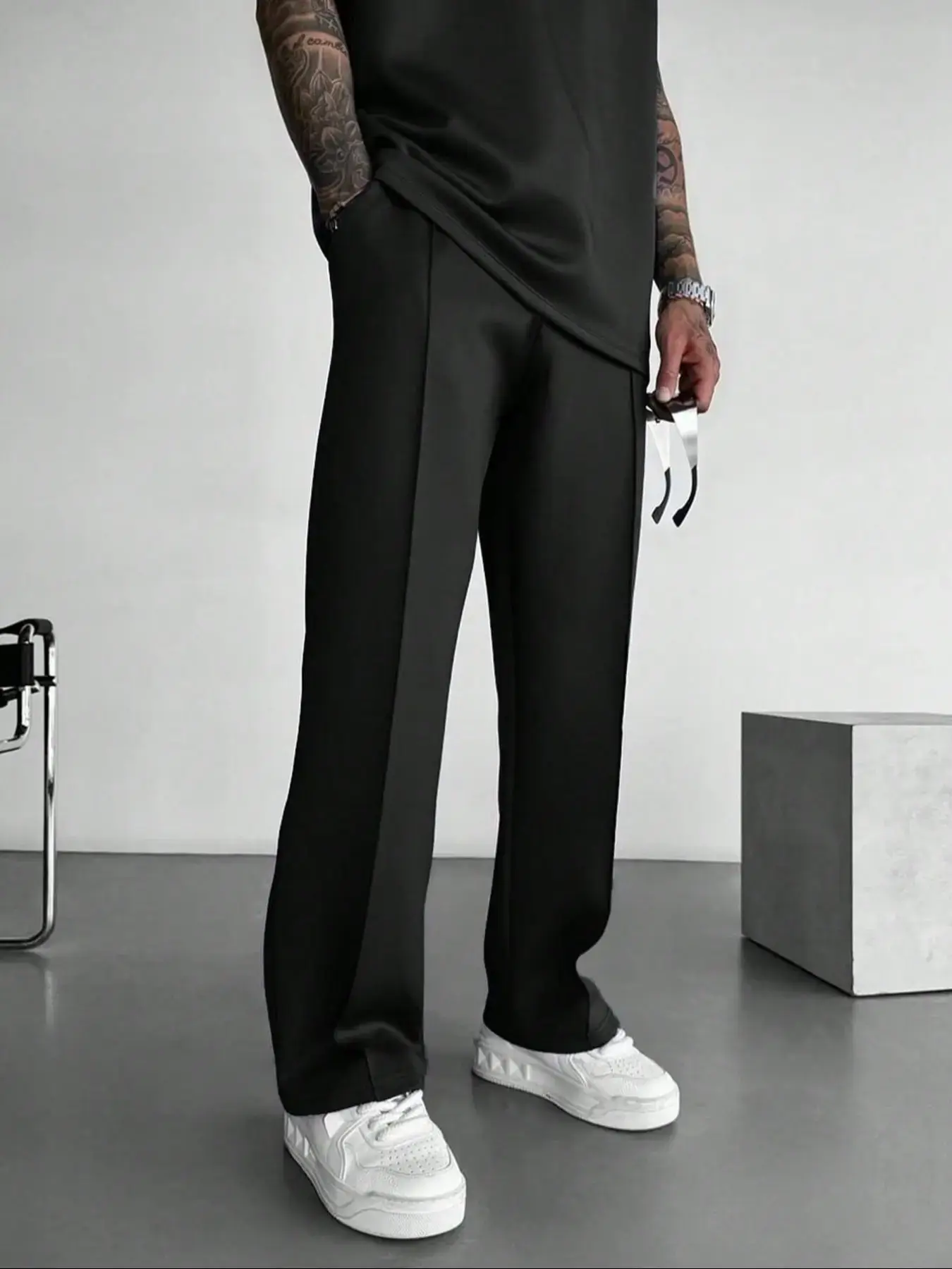 Soft premium cotton straight wide leg casual trousers with central front seam detailing, smooth wrinkle-resistant fabric relaxed full-length silhouette deep side pockets minimalist daily bottom staple for sleek street mensfashion styling