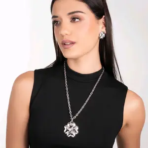 Platinum plated clover pendant necklace with modern polished design