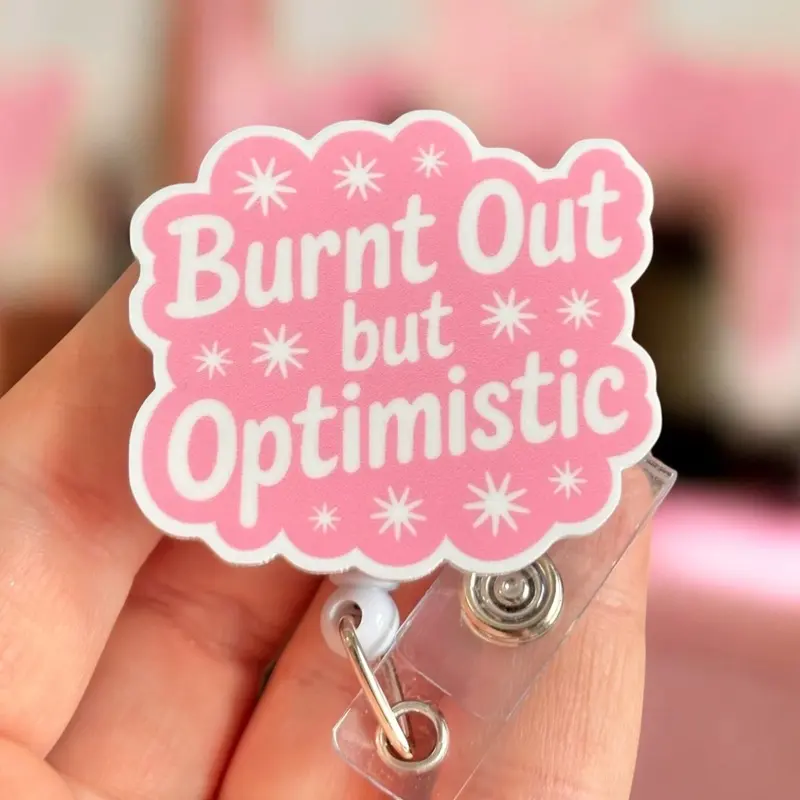Glitter My Badge Burt out but optimistic badge reel for nurse and hospital workers. Badge clip Badge pull - Retractable swivel clip with a 360 rotation. Great gift for coworker