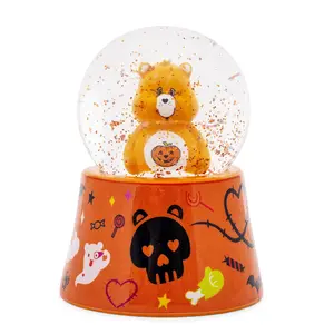 Care Bears Trick-Or-Sweet Bear Mini Light-Up Snow Globe | 3 Inches Tall Care Bears Trick-Or-Sweet Bear Mini Light-Up Snow Globe | 3 Inches Tall