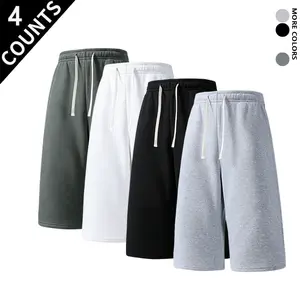 Two-pack athletic shorts—breathable seven-eighths length shorts suitable for running, fitness training, and everyday casual wear; trendy styling and versatile for layering.