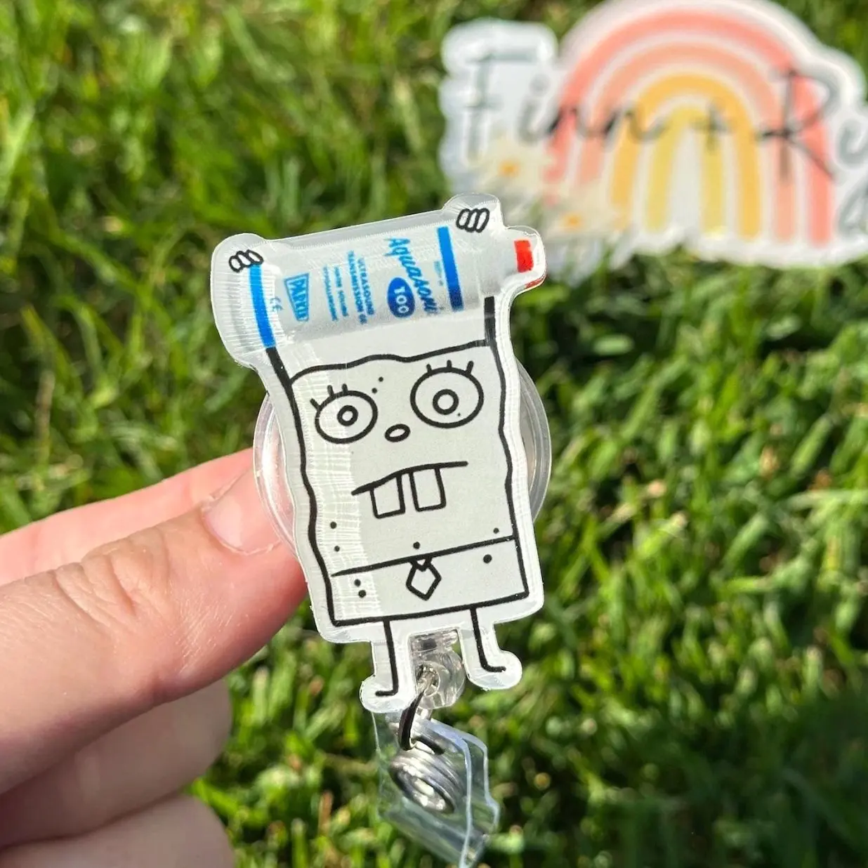 Cartoon Doodle with Ultrasound Gel Bottle Badge Reel