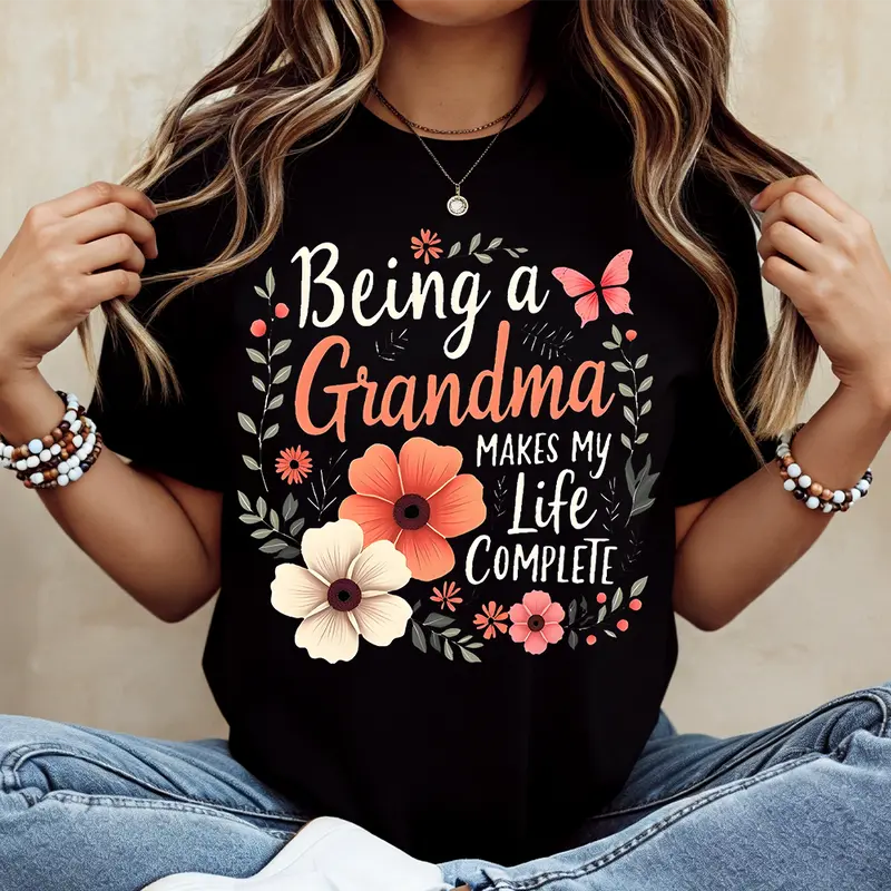 Being A Grandma Makes My Life Complete Floral Butterfly Print T Shirt Black Casual Loose Fit Tee For Women Perfect For Everyday Wear And Leisure Activities