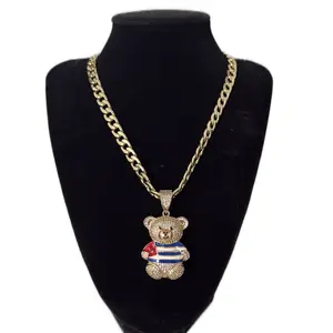 Cadena cubana mide 16 pulgadas  con dije de oso con la bandera de Cuba 14k oro laminado