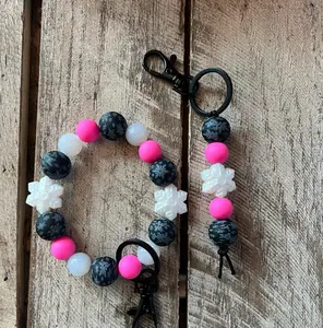 Pink and Black Snowflake Keychain Set