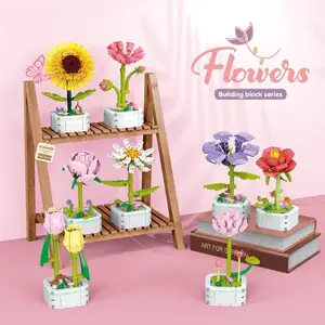Handmade Flower Bouquet Potted Plants. Each pot features hand - crafted, long - lasting artificial flowers paired with an exquisite flowerpot. They are perfect as fruit - themed decorations, gifts, or decorative ornaments.