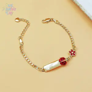 Ladybug and Red Flower Enamel Gold Bracelet with Customizable Engravable Bar Cute Insect and Floral Design with Lobster Clasp and Extension Chain Perfect for Kids and Women Delicate and Playful Accessory Ideal Gift for Birthdays and Daily Wear Lightweight