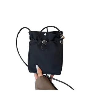 Mini Nylon Drawstring Bucket Bag For Women, Multi-Functional Casual Crossbody Phone Purse, Lightweight Portable Handheld Coin Purse With Adjustable Shoulder Strap, Stylish Solid Color Minimalist Design Ideal For Daily Errands Shopping Travel And Everyday