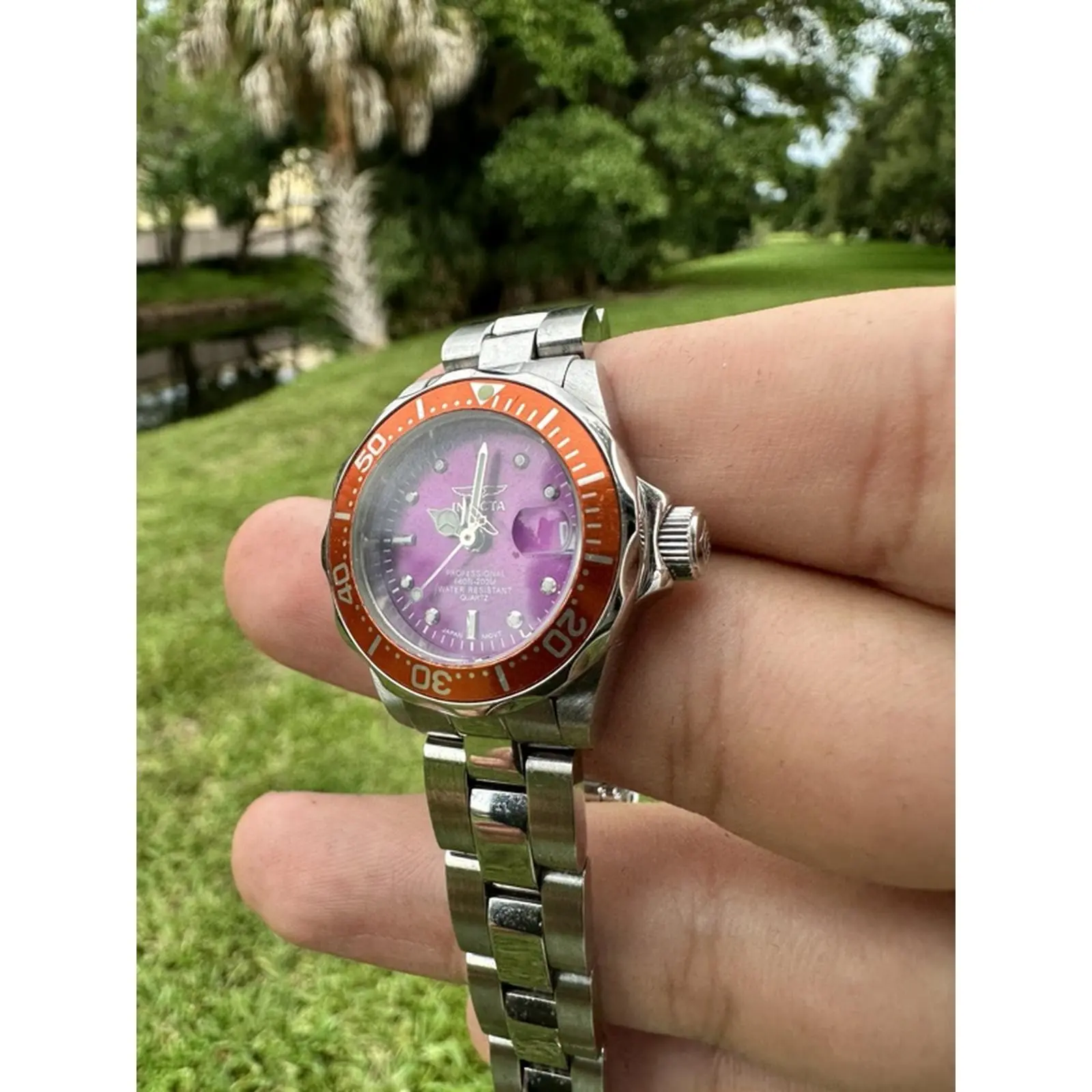Invicta Pro Diver 11439 Women's Watch with Purple Dial Orange Bezel Stainless Steel Bracelet Japanese Quartz Movement Pre-Owned