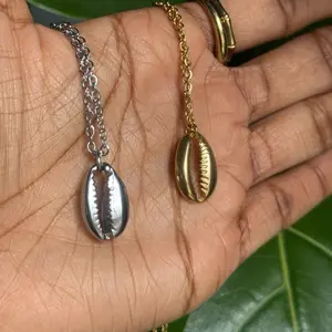 Elegant Cowrie Shell Pendant Necklace in Silver & Gold Stainless Steel Options. Water Resistant Tarnish free Jewlery