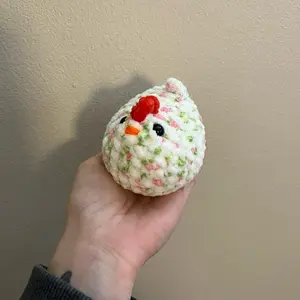 Hand crocheted white and pink blossom chicken