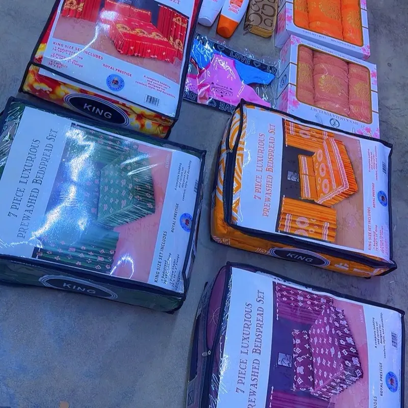 16 Mixed items  4 bedspread 7 pieces  5 panties  6 towels 4 lotion 5 mini perfume 1 gift purse
