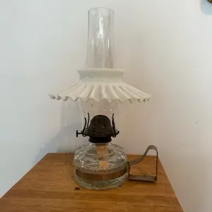 Kerosene lantern with milk glass shade