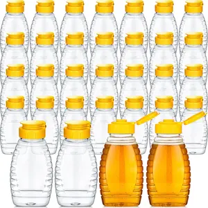 32 pcs 8.8 oz clear plastic empty honey jars with caps, refillable leakproof squeeze containers with flip lids for storage (yellow)