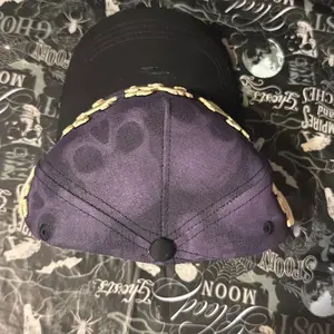 DANDY HATS SKELLY LIMITED EDITION JUST HAT SOLO GORRA Purple Camo Design with Gold Trim Adjustable Fit