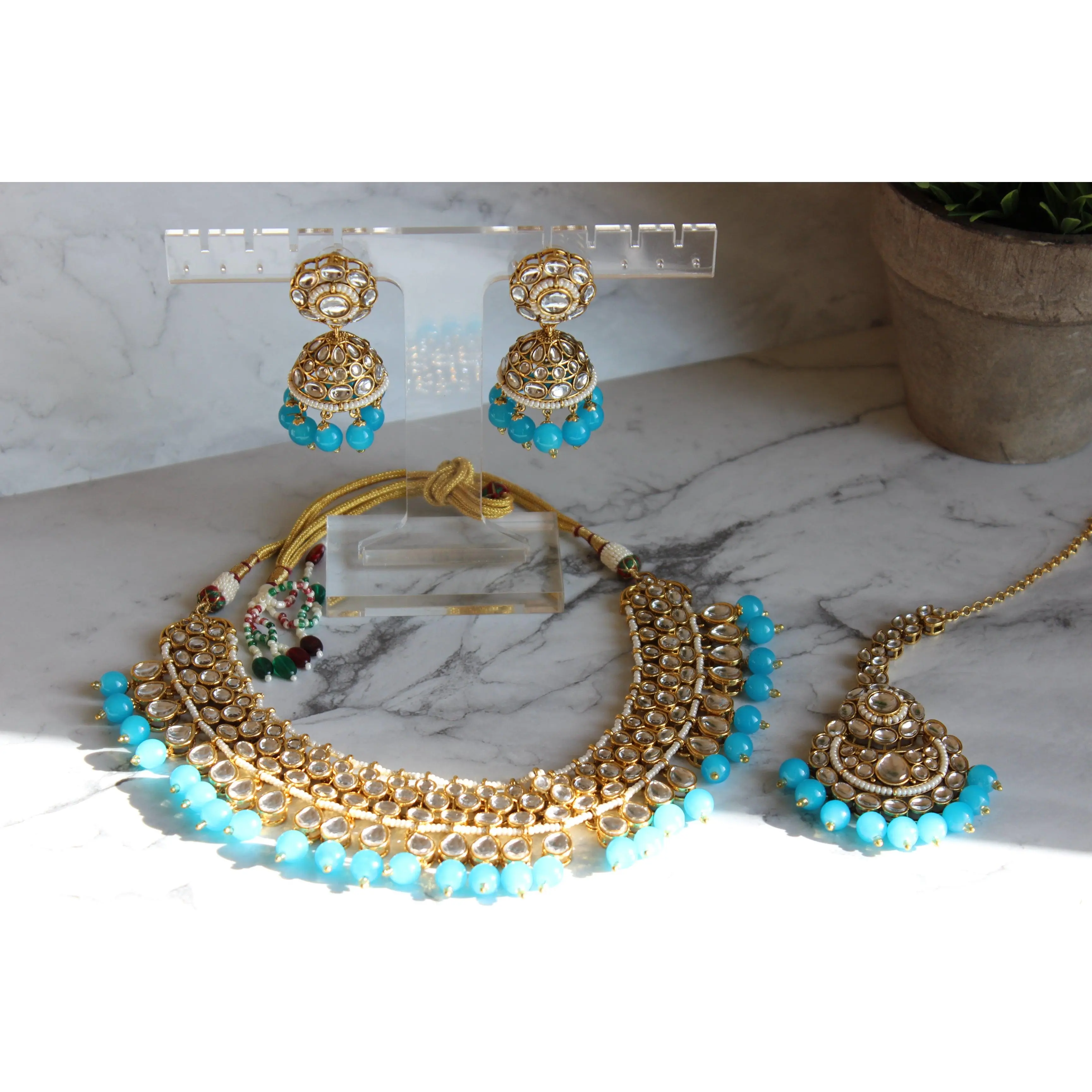 Divya Pearl Kundan Necklace Set (Includes Earrings & Tikka)