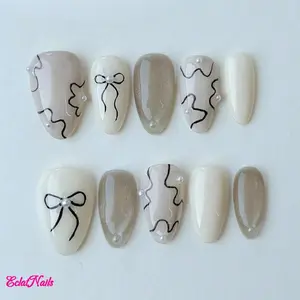 EclatNails 10pcs Handmade Press On Nails, Cream White & Champagne Beige with Black Bow, Wavy Lines & Pearl Accents, Minimalist Playful Almond Fake Nails, All-Season Reusable Removable False Nails for Daily & All Occasions