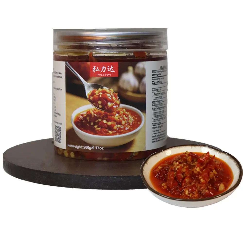 Garlic chili sauce with an Asian flavor profile, containing fresh garlic, chili peppers, and vegetable oil; suitable for a vegan diet; low cholesterol; ideal for home cooking and as a dipping sauce for dumplings; can be stored at room temperature or refri