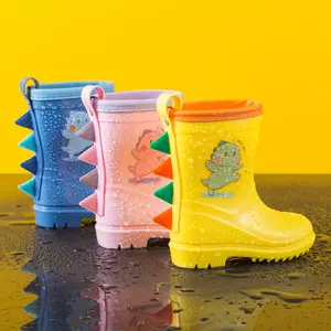 A pair of children's dinosaur rain boots, lightweight and comfortable, with sturdy soles. Suitable for outdoor camping for boys, infants, toddlers, and elementary school students.