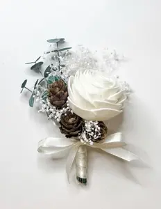 White Boutonniere With Pinecones