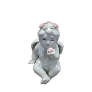 Vtg Iridescent Porcelain Angel Statue Sitting 6" Tall Pink Roses