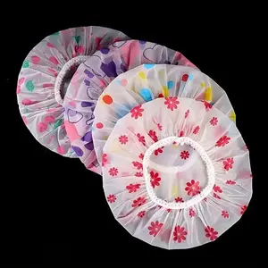A set of 4 adjustable printed shower caps with elastic bands - reusable, perfect for women in spas, hair salons, and bathrooms