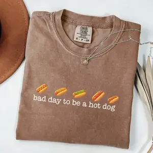 Bad Day To Be A Hot Dog Shirt, Funny Hot Dog Graphic Tee, BBQ Cookout Food Shirt, Retro Funny Food Shirt, 4th Of July BBQ Shirt, Summer Cookout Graphic Tee, Funny BBQ Party Shirt, BBQ Gift For Men Women, Made In USA