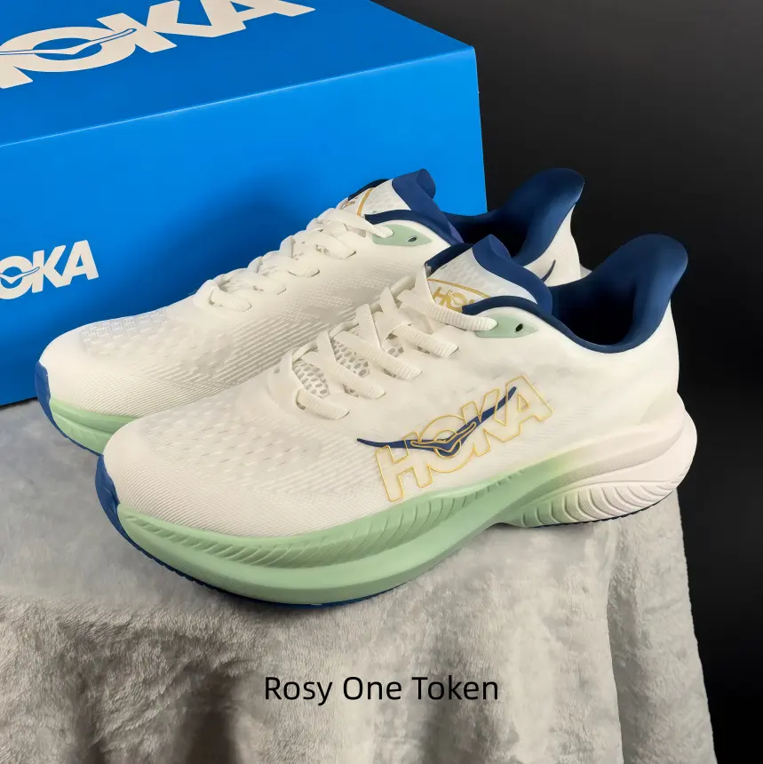 Soft cream chunky cushioned trainer as core staple for minimalist fresh casual fits. Matte pale woven upper paired with mint trim and navy details creates quiet elegant layers. It fits shorts and loose tees for muted spring aesthetic street photo shoots.