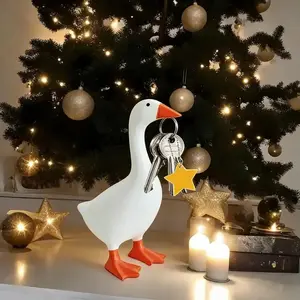 Decorative holiday gifts 7-Inch Resin Desk Goose Statue with Magnetic Beak Funny Desktop Figurine Key Holder for Office Home Decor Cute Christmas Gift Housewarming Ornament Silly Decoration Abstract Figure Sculpture Home Decore