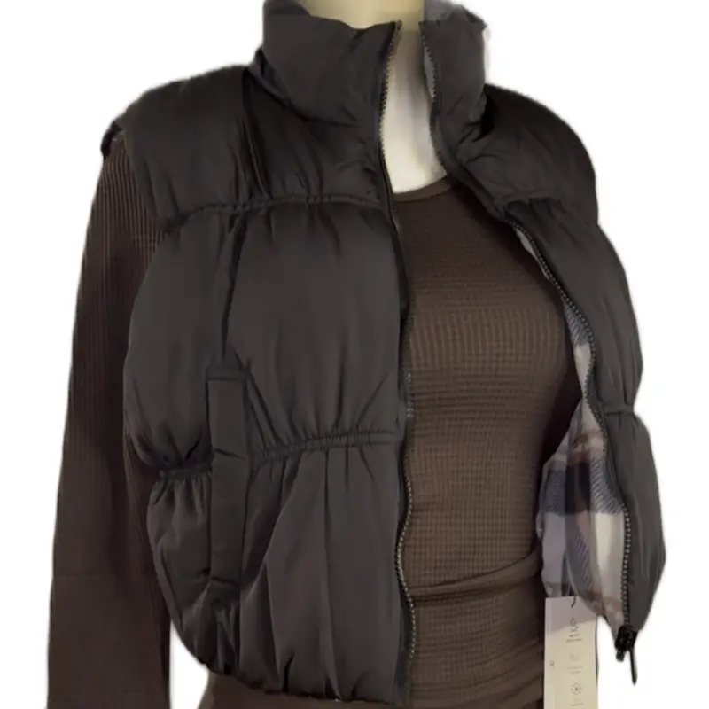 Womens cropped reversible puffer Vests with pockets on the sides