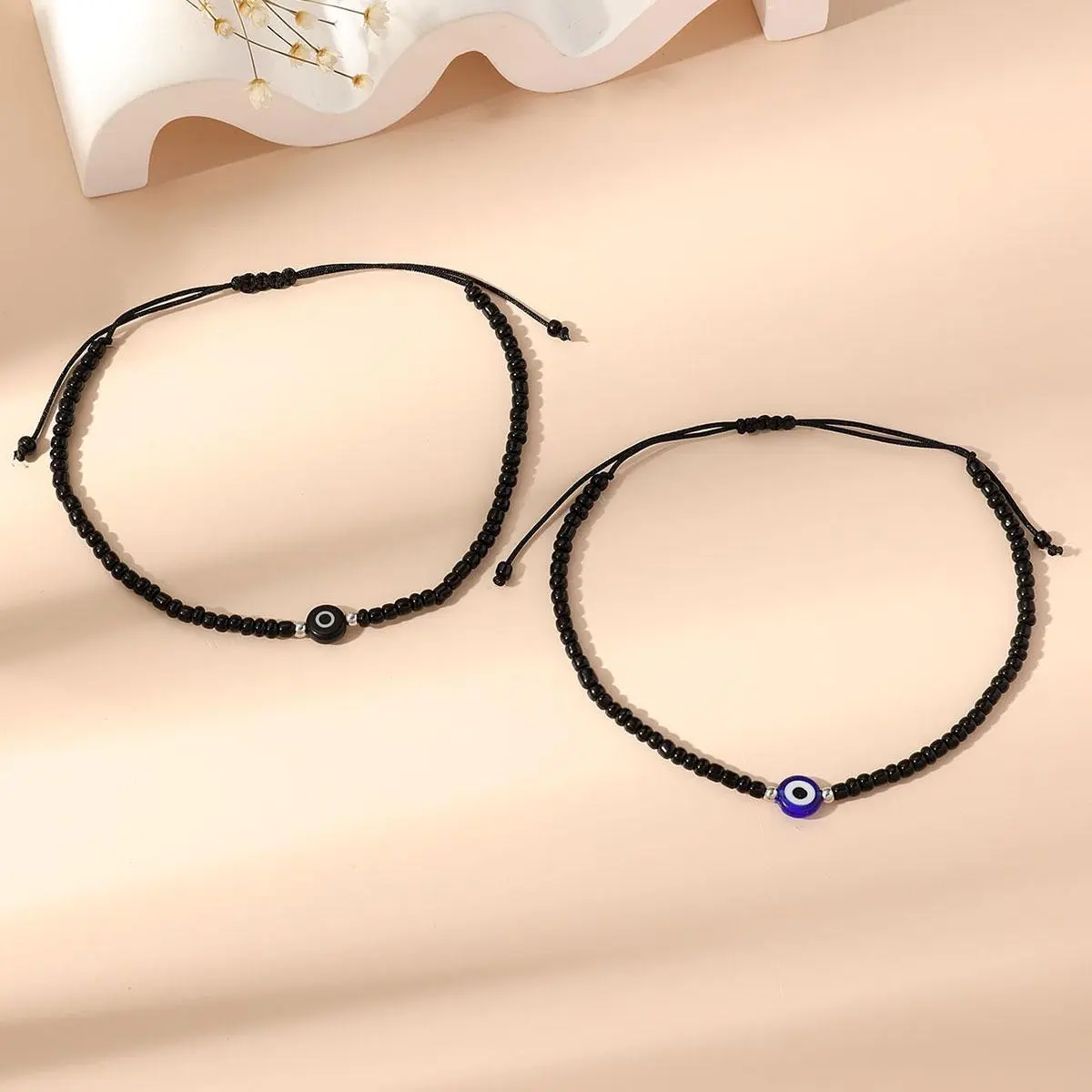 Black Beaded Evil Eye Anklet with Adjustable Sliding Knot Cord, Blue or Black Round Eye Charm and Silver Tone Accents, Minimalist Boho Ankle Jewelry for Women and Men, Beach Vacations, Summer Outfits, Casual Wear and Layering