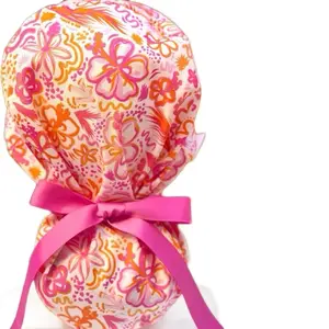 Pink and orange floral scrub caps