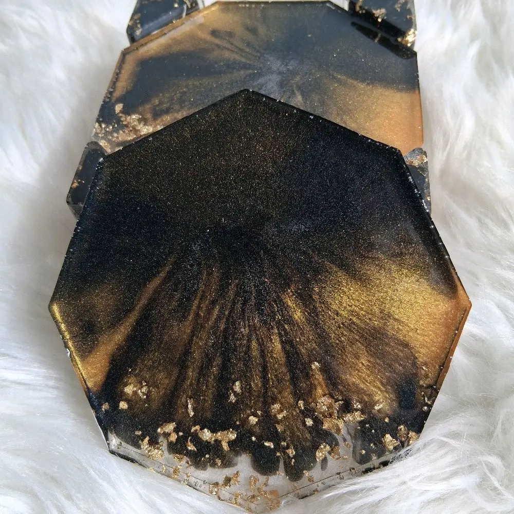 Luxe Black and Gold 6 Piece Coaster Set with Elegant Hexagonal Design and Sparkling Gold Accents